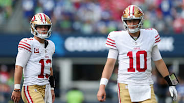 San Francisco 49ers quarterbacks Brock Purdy (13) and Mac Jones (10)
