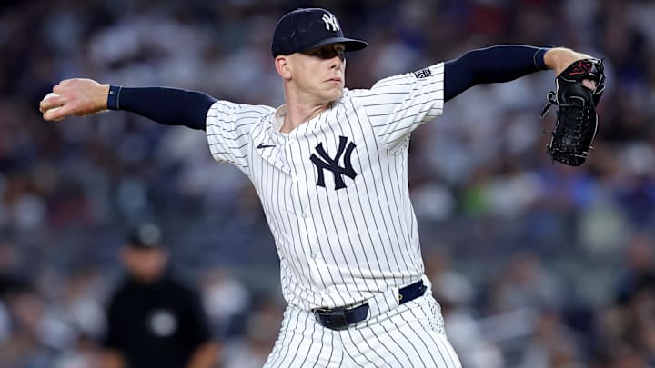 Jun 7, 2024; Bronx, New York, USA; New York Yankees relief pitcher Ian Hamilton (71) pitches against the Los Angeles Dodgers during the tenth inning at Yankee Stadium. Mandatory Credit: Brad Penner-Imagn Images