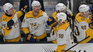 Jan 25, 2025; Anaheim, California, USA; Nashville Predators center Ryan O'Reilly (90) is congratulated at the bench after scoring a goal in the second period against the Anaheim Ducks at Honda Center. Mandatory Credit: Jayne Kamin-Oncea-Imagn Images