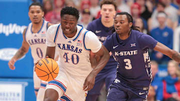 Kansas Jayhawks forward Flory Bidunga (40) runs the ball back after a Kansas State Wildcats rebound in the first half of the Sunflower Showdown game inside Allen Fieldhouse Saturday, Jan. 18, 2025.