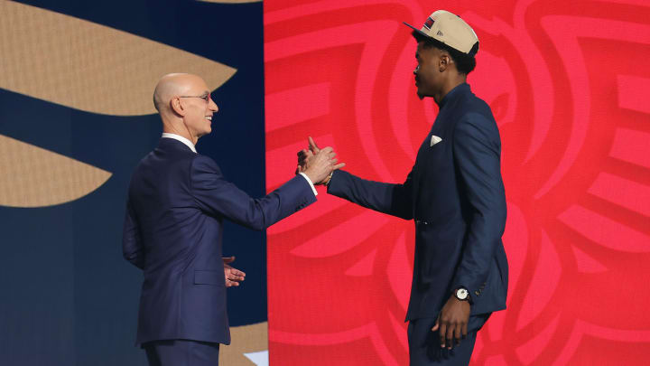 Jun 26, 2024; Brooklyn, NY, USA; Yves Missi shakes hands with NBA commissioner Adam Silver after being selected in the first round by the Phoenix Suns in the 2024 NBA Draft at Barclays Center.