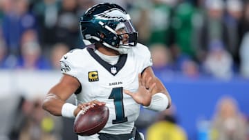Oct 9, 2025; East Rutherford, New Jersey, USA; Philadelphia Eagles quarterback Jalen Hurts (1) passes the ball against the New York Giants during the first quarter of the game at MetLife Stadium. Mandatory Credit: Brad Penner-Imagn Images