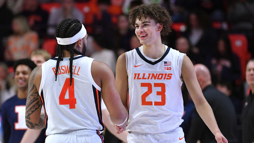 Dec 29, 2025; Champaign, Illinois, USA;  Illinois Fighting Illini guard Keaton Wagler (23) and teammate Kylan Boswell (4) react in the closing minutes of the second half against the Southern University Jaguars  at State Farm Center. Mandatory Credit: Ron Johnson-Imagn Images