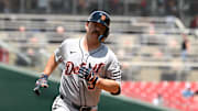 Jake Rogers, in his day job as a catcher, rounds third base after a home run against the Nationals.
