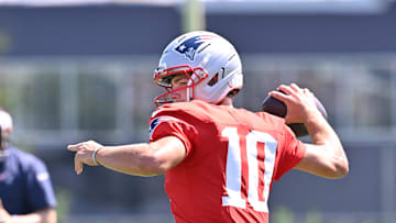 Jul 28, 2025; Foxborough, MA, USA; New England Patriots quarterback Drake Maye (10) throws a pass during training camp at Gillette Stadium. Mandatory Credit: Eric Canha-Imagn Images