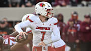 Nov 1, 2025; Blacksburg, Virginia, USA; Louisville Cardinals quarterback Miller Moss (7) looks to pass against the Virginia Tech Hokies during the second quarter at Lane Stadium. Mandatory Credit: Brian Bishop-Imagn Images