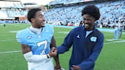 Sep 13, 2025; Chapel Hill, North Carolina, USA; North Carolina Tar Heels quarterback Gio Lopez (7) celebrates with a teammate after the game at Kenan Stadium. Mandatory Credit: Bob Donnan-Imagn Images