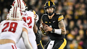 Nov 2, 2024; Iowa City, Iowa, USA; Iowa Hawkeyes quarterback Brendan Sullivan (1) controls the offense against the Wisconsin Badgers during the second quarter at Kinnick Stadium. Mandatory Credit: Jeffrey Becker-Imagn Images