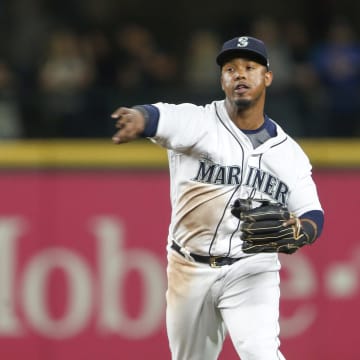 Seattle Mariners shortstop Jean Segura (2) commits a throwing error against the Baltimore Orioles during the fifth inning at Safeco Field in 2018.