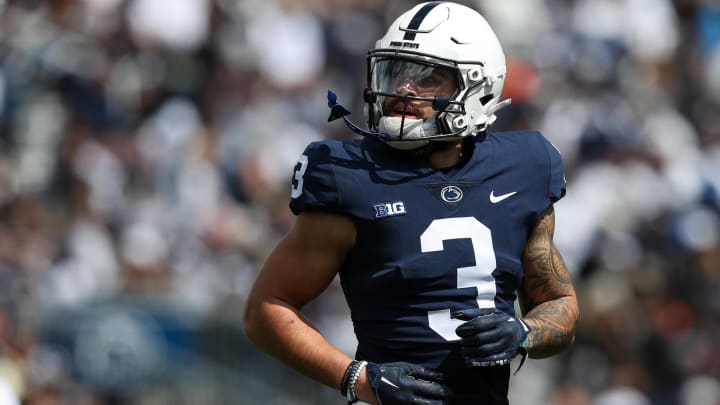 Penn State wide receiver Julian Fleming  runs to the line of scrimmage during the Blue-White Game at Beaver Stadium.