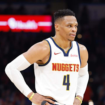 Mar 9, 2025; Oklahoma City, Oklahoma, USA; Denver Nuggets guard Russell Westbrook (4) stands during Oklahoma City Thunder free throws during the second half at Paycom Center. Mandatory Credit: Alonzo Adams-Imagn Images