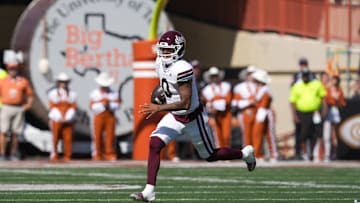 Sep 28, 2024; Austin, Texas, USA;  Mississippi State Bulldogs quarterback Michael Van Buren Jr. (0) runs the ball in the first half against the Texas Longhorns at Darrell K Royal-Texas Memorial Stadium. Mandatory Credit: Daniel Dunn-Imagn Images