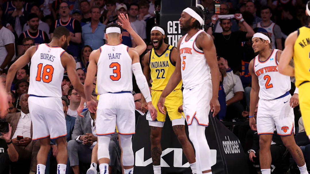 May 19, 2024; New York, New York, USA; Indiana Pacers forward Isaiah Jackson (22) reacts during the fourth quarter of game seven of the second round of the 2024 NBA playoffs against New York Knicks guards Alec Burks (18) and Josh Hart (3) and forward Precious Achiuwa (5) and guard Miles McBride (2) at Madison Square Garden. Mandatory Credit: Brad Penner-Imagn Images