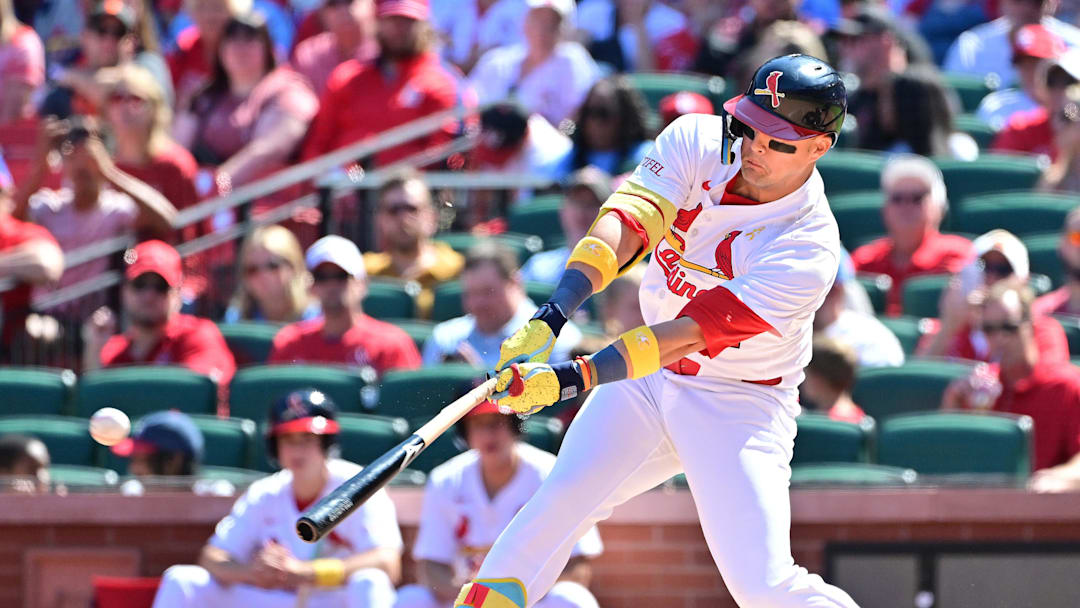 Sep 7, 2025; St. Louis, Missouri, USA; St. Louis Cardinals outfielder Lars Nootbaar (21) singles in the fifth inning for an RBI against the San Francisco Giants at Busch Stadium. Mandatory Credit: Tim Vizer-Imagn Images