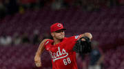 Cincinnati Reds pitcher Carson Spiers (68) throws to the San Diego Padres as thunderstorms make their way to Great American Ball Park in Cincinnati Wednesday, May 22, 2024.