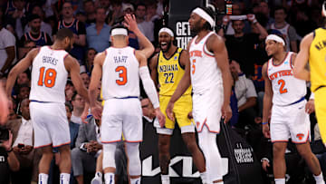May 19, 2024; New York, New York, USA; Indiana Pacers forward Isaiah Jackson (22) reacts during the fourth quarter of game seven of the second round of the 2024 NBA playoffs against New York Knicks guards Alec Burks (18) and Josh Hart (3) and forward Precious Achiuwa (5) and guard Miles McBride (2) at Madison Square Garden. Mandatory Credit: Brad Penner-Imagn Images