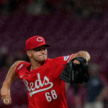 Cincinnati Reds pitcher Carson Spiers (68) throws to the San Diego Padres as thunderstorms make their way to Great American Ball Park in Cincinnati Wednesday, May 22, 2024.