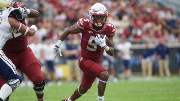 Redshirt sophomore running back Lawrance Toafili (9) rushes the ball. Florida State football defeated Georgia Tech, 41-16, On Oct. 29, 2022, at Doak Campbell Stadium.

J9t1409