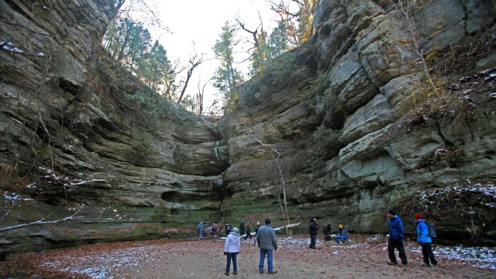 The walls of Wildcat Canyon rise high above hikers at Starved Rock State Park near Utica, Illinois.

Starvedrock Wildcat2