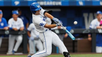 Jun 8, 2024; Lexington, KY, USA; Kentucky Wildcats outfielder Ryan Waldschmidt (21) hits a pitch during the sixth inning against the Oregon State Beavers at Kentucky Proud Park. Mandatory Credit: Jordan Prather-USA TODAY Sports