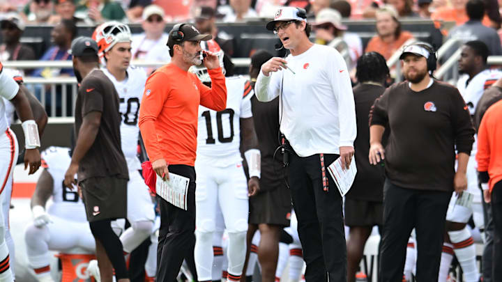 Aug 10, 2024; Cleveland, Ohio, USA; Cleveland Browns head coach Kevin Stefanski talks with offensive coordinator Ken Dorsey during the game against the Green Bay Packers at Cleveland Browns Stadium. Mandatory Credit: Ken Blaze-Imagn Images
