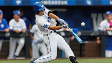 Jun 8, 2024; Lexington, KY, USA; Kentucky Wildcats outfielder Ryan Waldschmidt (21) hits a pitch during the sixth inning against the Oregon State Beavers at Kentucky Proud Park. Mandatory Credit: Jordan Prather-USA TODAY Sports