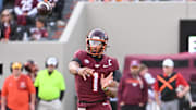 Nov 1, 2025; Blacksburg, Va.; Virginia Tech quarterback Kyron Drones (1) throws a pass against Louisville.