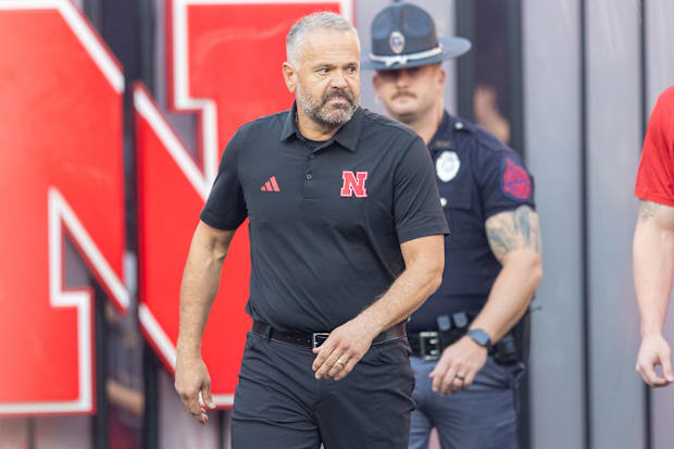 Nebraska football head coach Matt Rhule comes out of the tunnel prior to the game against Akron.