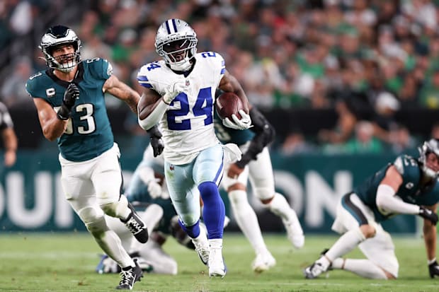 Dallas Cowboys running back Miles Sanders carries the ball against the Philadelphia Eagles.