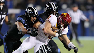 Nov 11, 2023; Provo, Utah, USA; Iowa State Cyclones running back Carson Hansen (26) runs the ball against the Brigham Young Cougars in the second half at LaVell Edwards Stadium. Mandatory Credit: Rob Gray-Imagn Images
