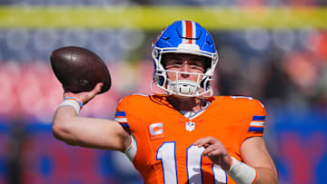 Oct 6, 2024; Denver, Colorado, USA; Denver Broncos quarterback Bo Nix (10) warms up before the game against the Las Vegas Raiders at Empower Field at Mile High. Mandatory Credit: Ron Chenoy-Imagn Images