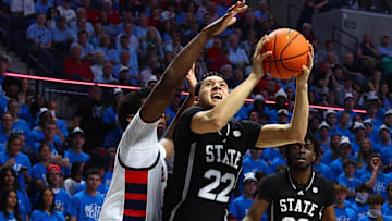 Feb 15, 2025; Oxford, Mississippi, USA; Mississippi State Bulldogs forward RJ Melendez (22) shoots as Mississippi Rebels forward Malik Dia (0) defends during the first half at The Sandy and John Black Pavilion at Ole Miss. Mandatory Credit: Petre Thomas-Imagn Images