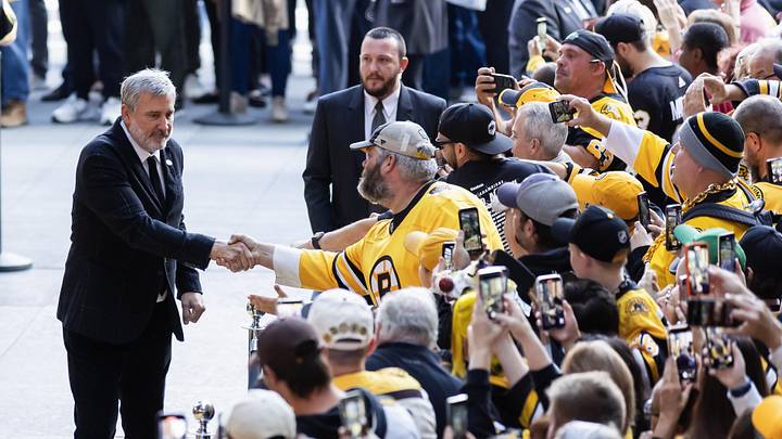 Oct 11, 2023; Boston, Massachusetts, USA; Boston Bruins President and Hockey Hall of Famer Cam Neely greets fans before the game between the Boston Bruins and the Chicago Blackhawks at TD Garden, the start of the Bruins 100th season in the NHL. Mandatory Credit: Winslow Townson-Imagn Images