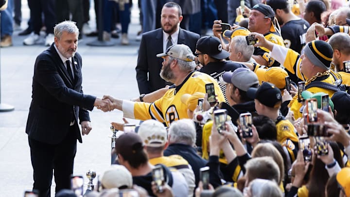 Oct 11, 2023; Boston, Massachusetts, USA; Boston Bruins President and Hockey Hall of Famer Cam Neely greets fans before the game between the Boston Bruins and the Chicago Blackhawks at TD Garden, the start of the Bruins 100th season in the NHL. Mandatory Credit: Winslow Townson-Imagn Images