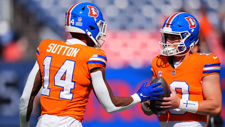 Oct 6, 2024; Denver, Colorado, USA; Denver Broncos wide receiver Courtland Sutton (14) and quarterback Bo Nix (10) before the game against the Las Vegas Raiders at Empower Field at Mile High.