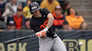 Oregon State infielder Aiva Arquette hits a single against Oregon during a game April 25 at PK Park.