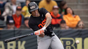 Oregon State infielder Aiva Arquette hits a single against Oregon during a game April 25 at PK Park.