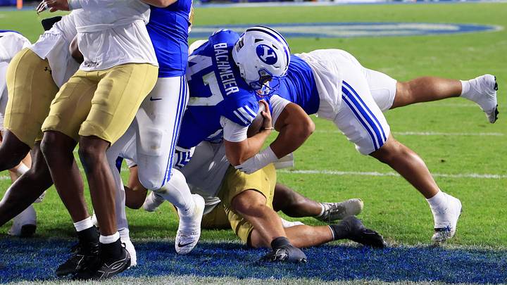 Oct 17, 2026; Provo, Utah, USA;  Brigham Young Cougars quarterback Bear Bachmeier (47) runs for a touchdown against the Notre Dame Fighting Irish during the first half at LaVell Edwards Stadium.  Mandatory Credit: Rob Gray-Imagn Images