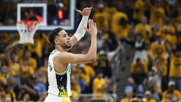 Apr 19, 2025; Indianapolis, Indiana, USA;  Indiana Pacers guard Tyrese Haliburton (0) celebrates a made basket  in the second half against the Milwaukee Bucks at Gainbridge Fieldhouse. Mandatory Credit: Trevor Ruszkowski-Imagn Images