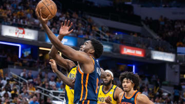 May 12, 2024; Indianapolis, Indiana, USA; New York Knicks guard Shake Milton (13)  shoots the ball while Indiana Pacers forward Jalen Smith (25) defends during game four of the second round for the 2024 NBA playoffs at Gainbridge Fieldhouse. Mandatory Credit: Trevor Ruszkowski-USA TODAY Sports