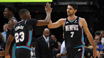 Oct 22, 2025; Memphis, Tennessee, USA; Memphis Grizzlies forward Santi Aldama (7) reacts with forward Cedric Coward (23) during the third quarter against the New Orleans Pelicans at FedExForum. Mandatory Credit: Petre Thomas-Imagn Images