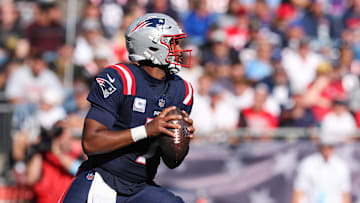 Oct 6, 2024; Foxborough, Massachusetts, USA; New England Patriots quarterback Jacoby Brissett (7) looks to pass during the second half against the Miami Dolphins at Gillette Stadium. Mandatory Credit: Paul Rutherford-Imagn Images