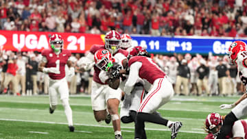 Dec 6, 2025; Atlanta, GA, USA; Georgia Bulldogs wide receiver Zachariah Branch (1) scores a touchdown during the fourth quarter against the Alabama Crimson Tide during the 2025 SEC Championship game at Mercedes-Benz Stadium. 