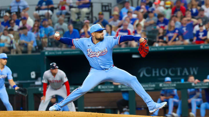 Aug 4, 2024; Arlington, Texas, USA; Texas Rangers starting pitcher Nathan Eovaldi (17) throws during the first inning against the Boston Red Sox at Globe Life Field. Mandatory Credit: Kevin Jairaj-USA TODAY Sports