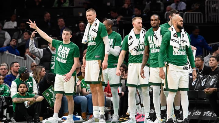 Boston Celtics bench reacts.