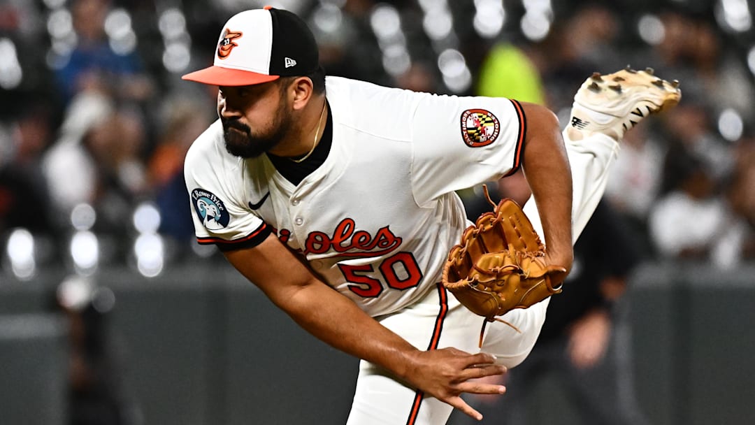 Sep 9, 2025; Baltimore, Maryland, USA;  Baltimore Orioles pitcher Rico Garcia (50) delivers a pitch during the eighth inning against the Pittsburgh Pirates at Oriole Park at Camden Yards. Mandatory Credit: James A. Pittman-Imagn Images