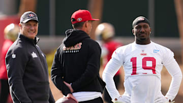San Francisco 49ers general manager John Lynch (L), head coach Kyle Shanahan (C) and wide receiver Deebo Samuel (R)