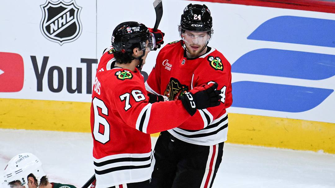 Sep 21, 2026; Chicago, Illinois, USA;  Chicago Blackhawks defenseman Bowen Byram (24) celebrates with  left wing Nick Lardis (76)  after he scored the game winning goal during the overtime period against the Minnesota Wild  at the United Center.  Mandatory Credit: Matt Marton-Imagn Images