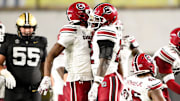 Nov 9, 2024; Nashville, Tennessee, USA;  South Carolina Gamecocks linebacker Bam Martin-Scott (22) celebrates the sack of Vanderbilt Commodores quarterback Diego Pavia (2) with defensive back Nick Emmanwori (7) at FirstBank Stadium. Mandatory Credit: Steve Roberts-Imagn Images