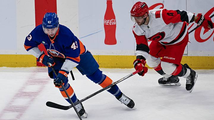 Apr 14, 2026; Elmont, New York, USA; New York Islanders center Liam Foudy (43) skates the puck into the zone defended by Carolina Hurricanes defenseman Shayne Gostisbehere (4) during the second period at UBS Arena. Mandatory Credit: Dennis Schneidler-Imagn Images Apr 14, 2026; Elmont, New York, USA; New York Islanders center Liam Foudy (43) skates the puck into the zone defended by Carolina Hurricanes defenseman Shayne Gostisbehere (4) during the second period at UBS Arena. Mandatory Credit: Dennis Schneidler-Imagn Images